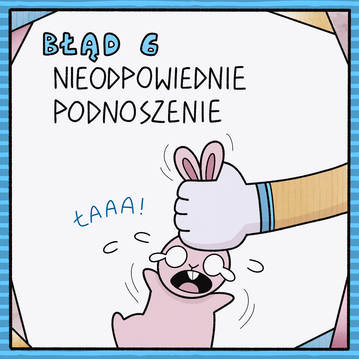 ręka trzymająca płaczącego królika za uszy